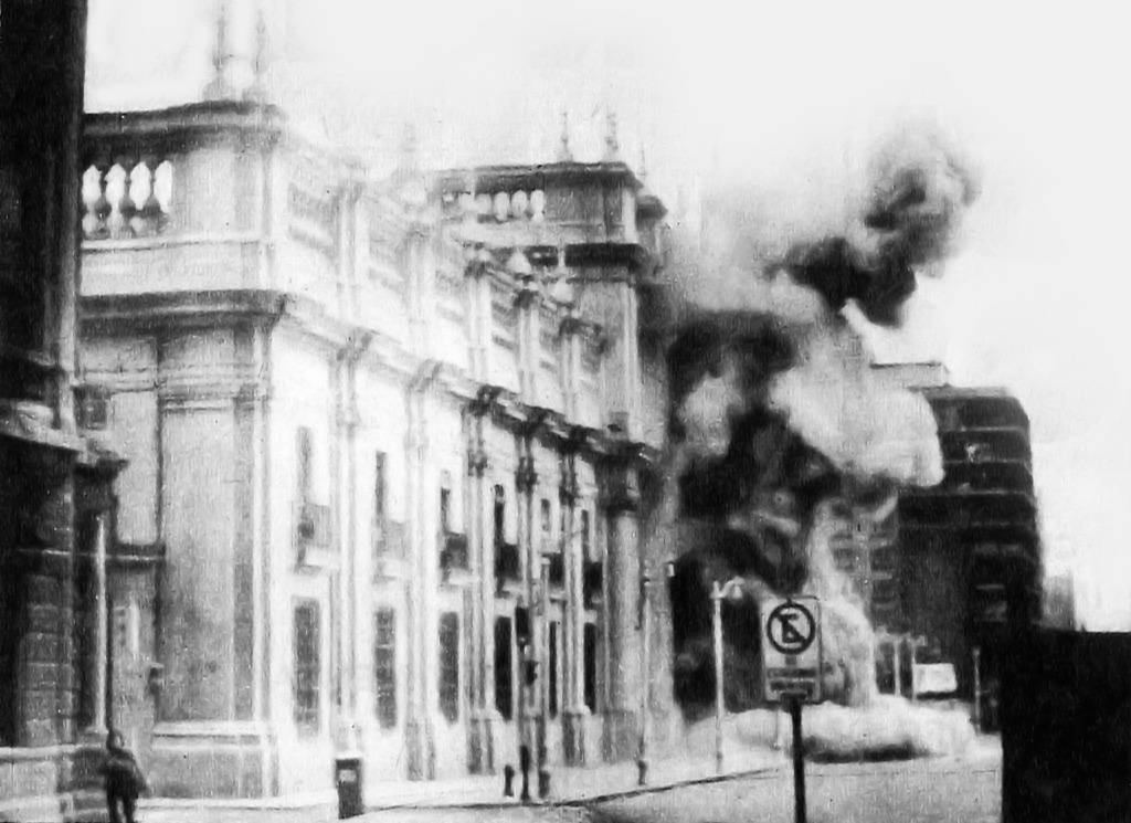 The Palacio de La Moneda in Santiago on fire and under attack during the 11 September 1973 coup in Chile.