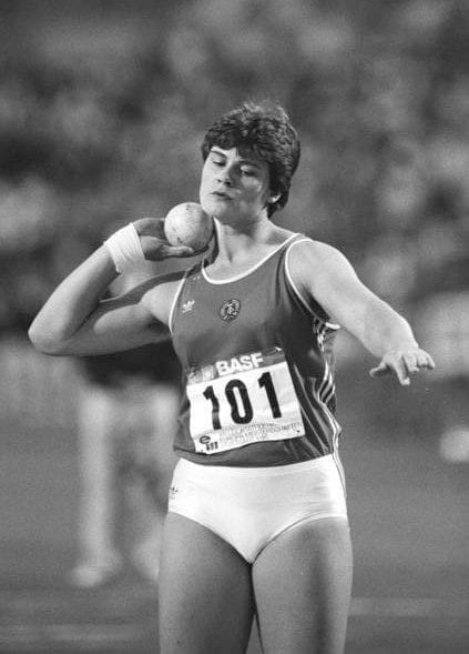 East German shot putter Heidi Krieger competing in the shot put at the 1986 European Athletics Championships in Stuttgart.