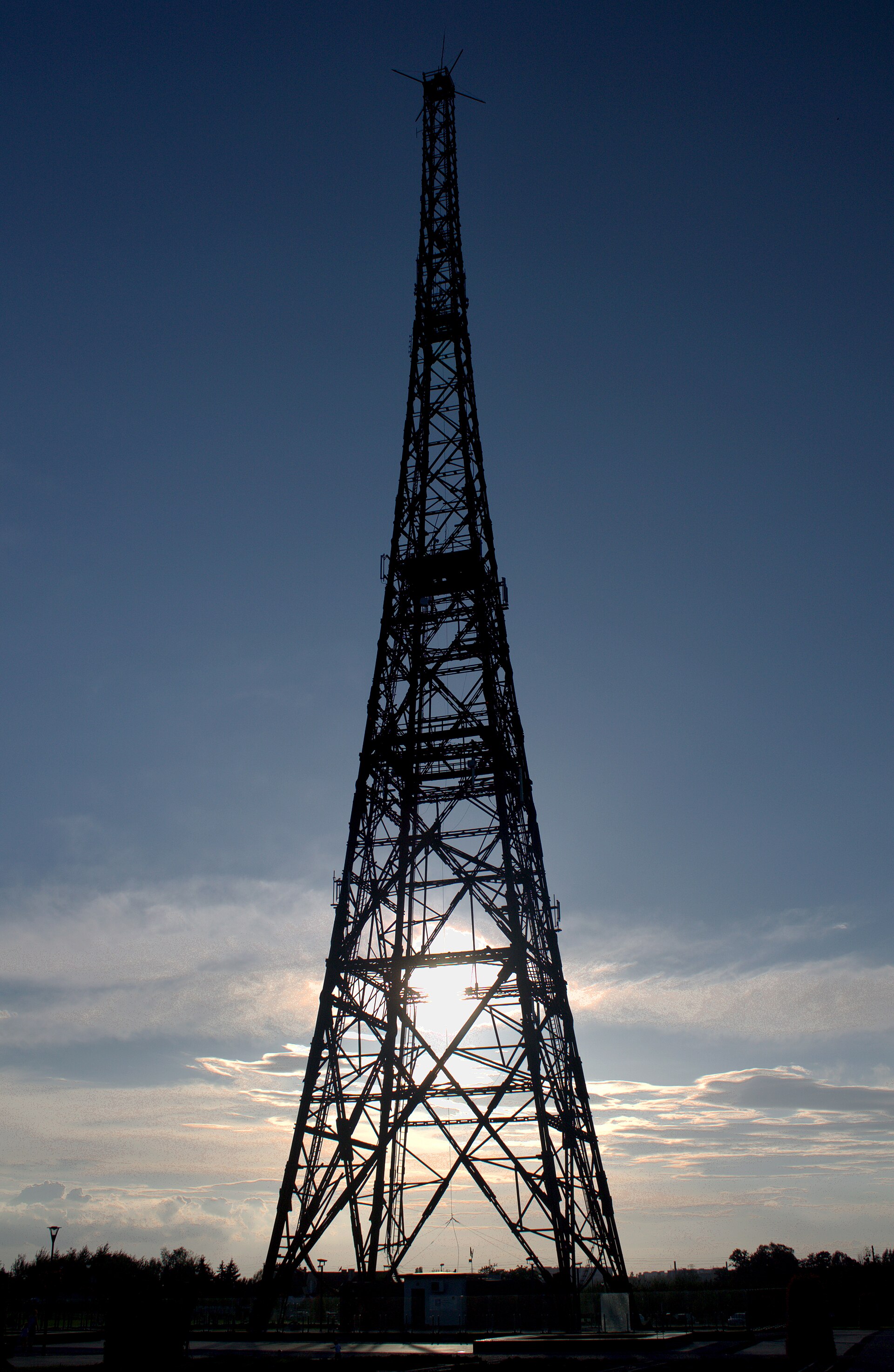 The wooden Gliwice (Gleiwitz) radio transmission tower seen against a bright sky.