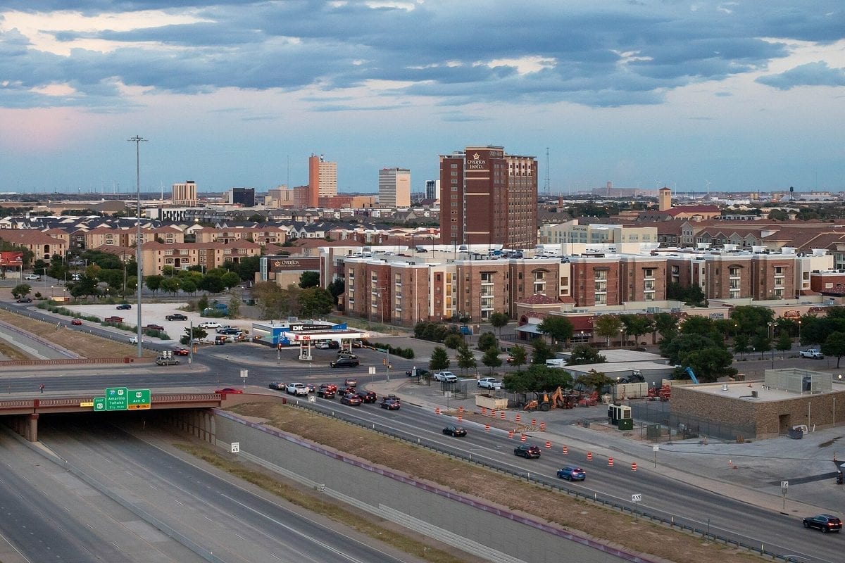 The skyline of Lubbock, Texas, photographed at dusk with buildings silhouetted against the sky