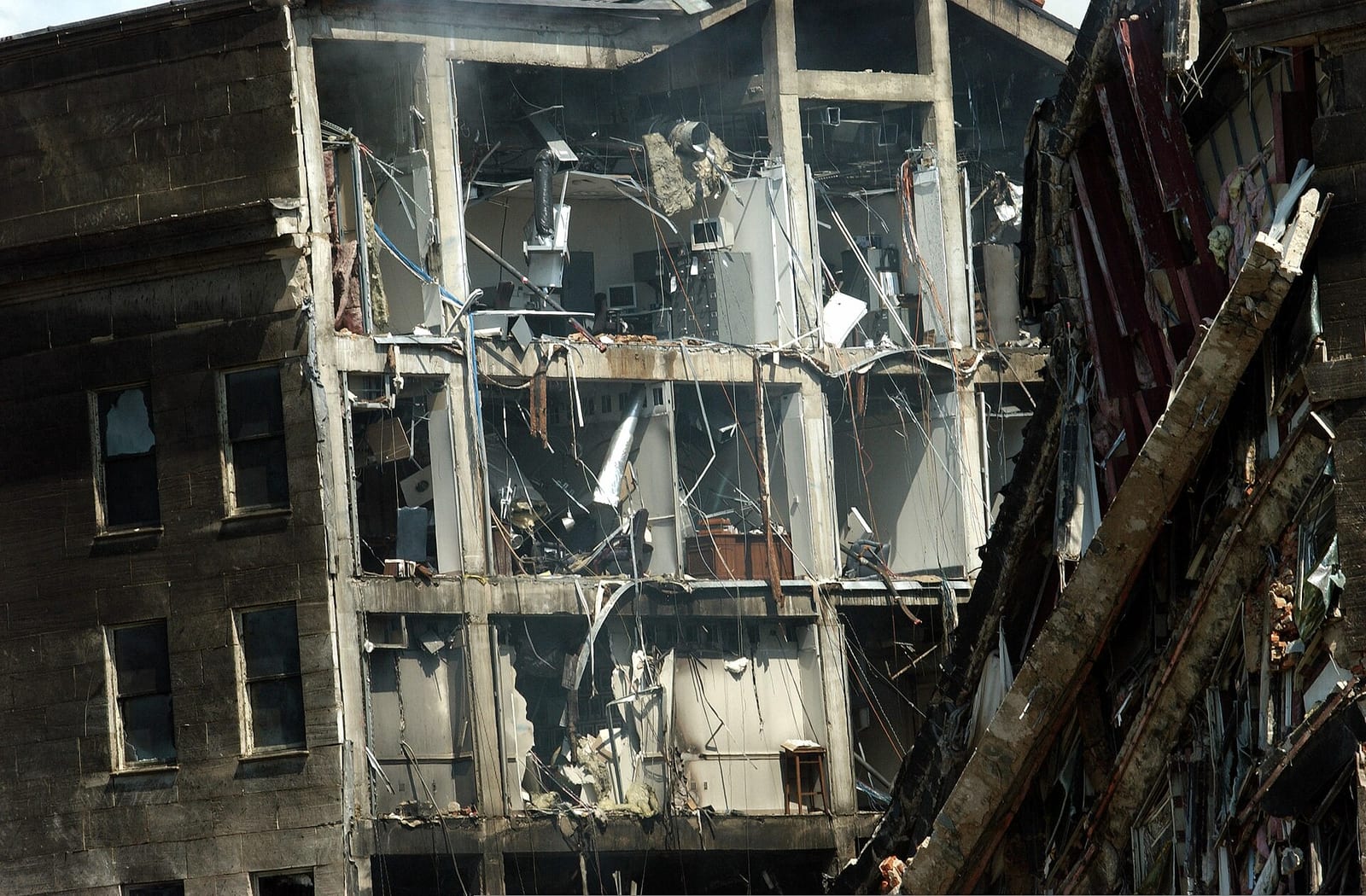 Exposed wreckage at the Pentagon impact site photographed after the smoke cleared on 11 September 2001.