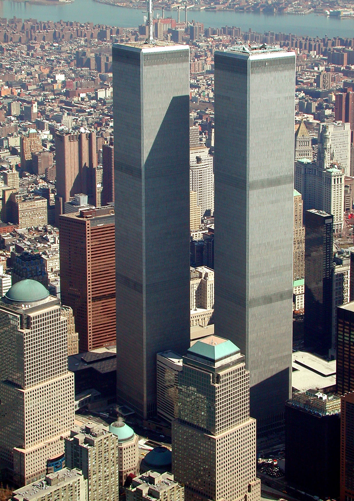 An aerial photograph of the World Trade Center complex in March 2001 showing the towers and neighbouring buildings.